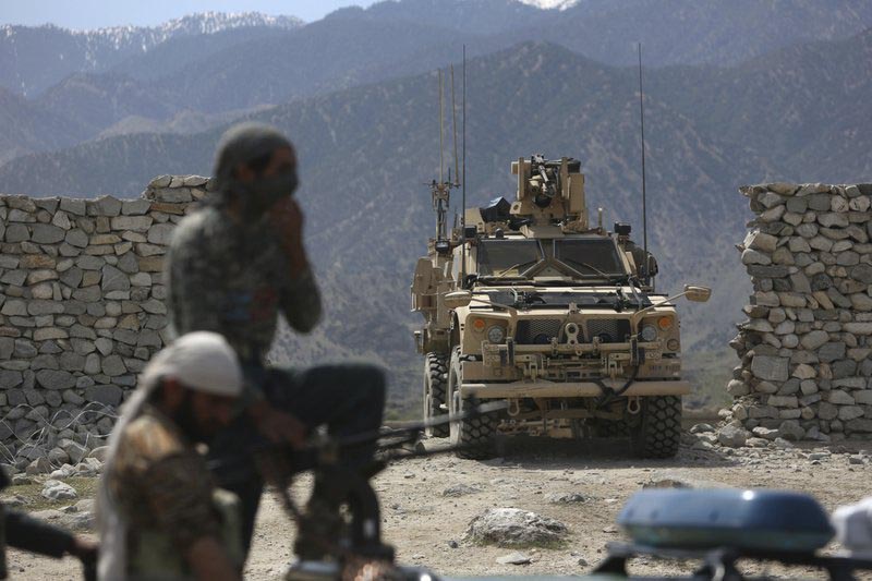 US forces and Afghan security police are seen in Asad Khil near the site of a US bombing in the Achin district of Jalalabad, east of Kabul, Afghanistan, on April 17, 2017. Photo: AP