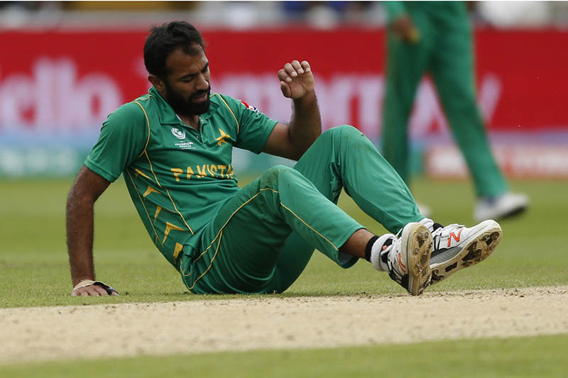 Pakistan's Wahab Riaz lies injured. Photo: Reuters