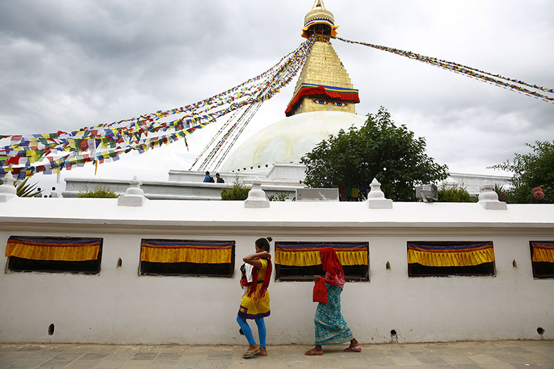 Nepali devotees circumambulate around the Boudhanath Stupa, a UNESCO Heritage Site in Kathmandu, on Tuesday, July 11, 2017. Photo: Skanda Gautam
