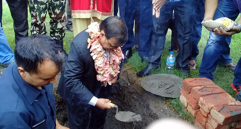 Deputy Prime Minister and Foreign Minister Krishna Bahadur Mahara lays the foundation stone for construction of a community fish feed industry in Ratnanagar of Chitwan district, on July 10, 2017. Photo: RSS