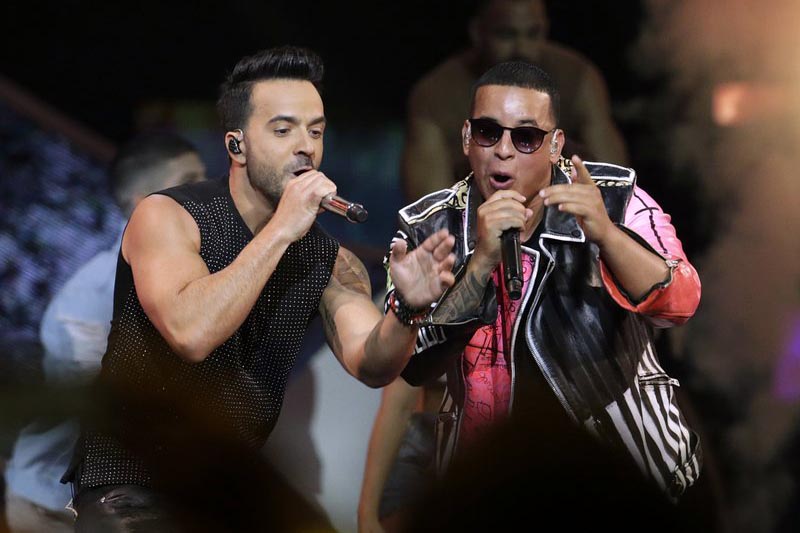 Singers Luis Fonsi, left and Daddy Yankee perform during the Latin Billboard Awards in Coral Gables, Florida, on April 27, 2017