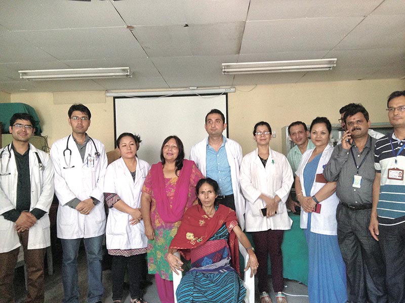 Dil Maya Sarki (centre) with the team of doctors involved in her sugery at TU Teaching Hospital, in Maharajgunj, Kathmandu, on July 7, 2017. Photo: THT