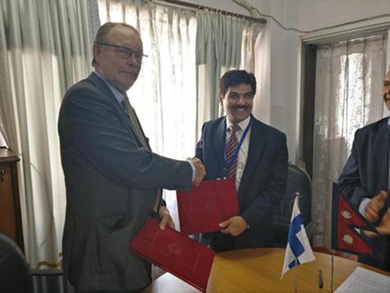 Finnish Ambassador to Nepal Jorma Suvanto and Joint Secretary of the Ministry of Finance Baikuntha Aryal  signing the agreement to provide Nepal rs 2.36 billion by Finland Government. Photo Courtsey: Finnish Embassy