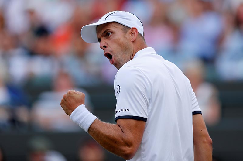 Luxembourgu2019s Gilles Muller celebrates during his fourth round match against Spainu2019s Rafael Nadal, at Wimbledon, in London, Britain, on July 10, 2017. Photo: Reuters