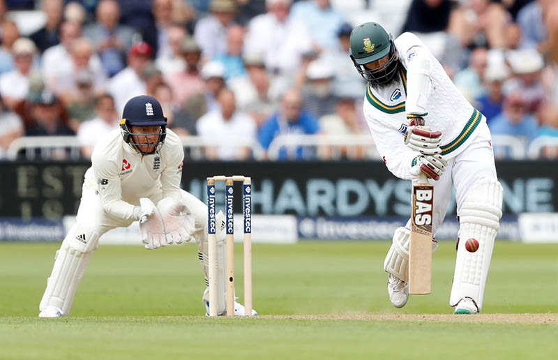 South Africa's Hashim Amla hits a six for his fifty. Photo: Reuters