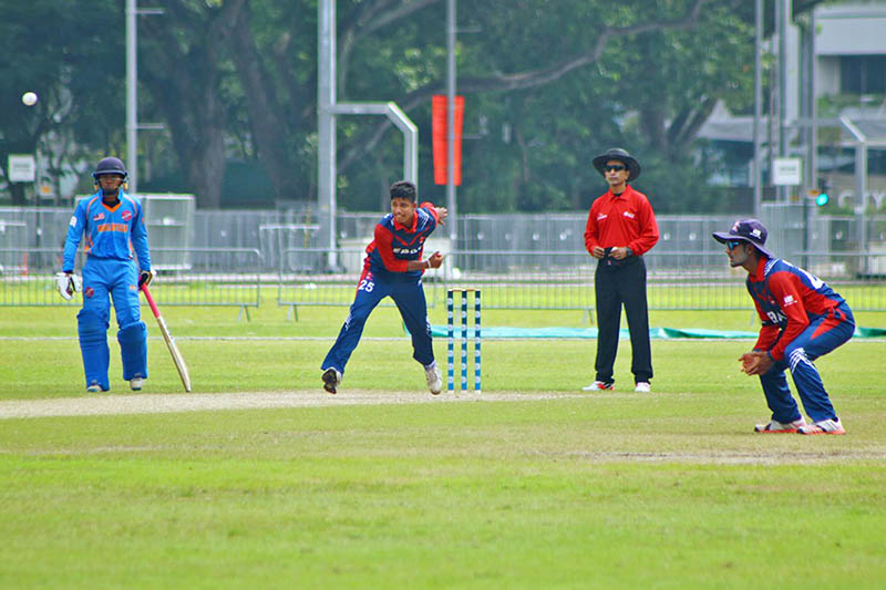 Nepali bowler bowls against Malaysia during ICC Asia U-19s World Cup Qualifier in Singapore, on Tuesday, July 18, 2017. Photo: RSS