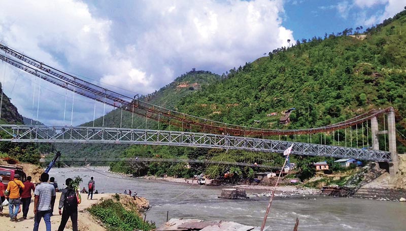 The under-construction bridge over the Dudhkoshi River at Jayaramghat in Khotang, on Wednesday, July 19, 2017. Photo: RSS