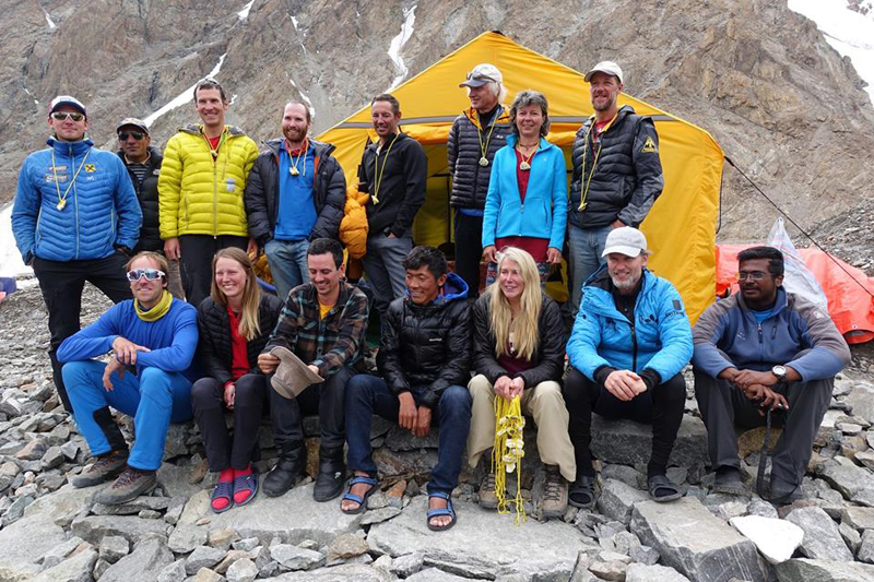 In this undated photo, mountaineers pose for a group photograph in Mt K2 region. Courtesy: Facebook