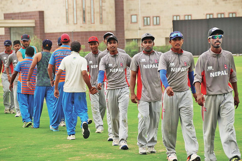 Nepali U-19 cricket team members (right) shake hands with players of Gurugram Sports Club after their practice match at the Gautam Buddha University Ground in Greater Noida on Wednesday, July 05, 2017. Photo Courtesy: Raman Shiwakoti