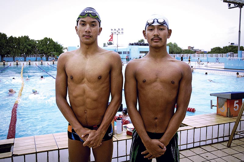 Nepali swimmers Suvam Shrestha and Anubhav Subba (right) during a training session at the International Sports Complex pool in Lalitpur, on Sunday. Photo: Naresh Shrestha / THT