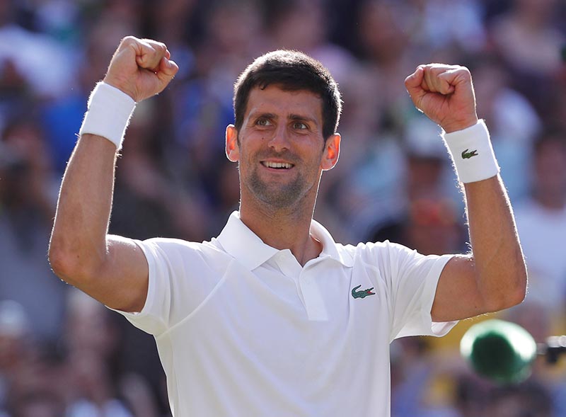 Serbiau2019s Novak Djokovic celebrates winning the third round match against Latviau2019s Ernests Gulbism, at Wimbledon, in London, Britain, on  July 8, 2017. Photo: Reuters