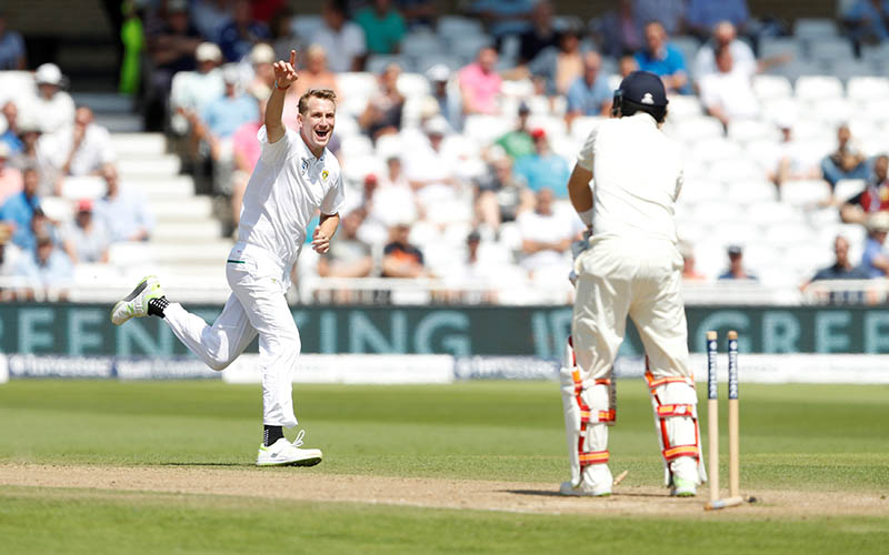 South Africa's Chris Morris celebrates the wicket of England's Joe Root. Photo: Reuters