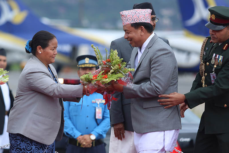Vice President Nanda Bahadur Pun being welcomed by Speaker Onsari Gharti Magar at TIA in Kathmandu, on Monday, July 10, 2017. Photo: RSS
