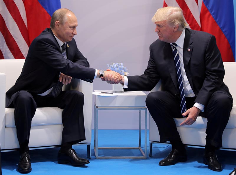 US President Donald Trump shakes hands with Russia's President Vladimir Putin during their bilateral meeting at the G20 summit in Hamburg, Germany, on July 7, 2017. Photo: Reuters