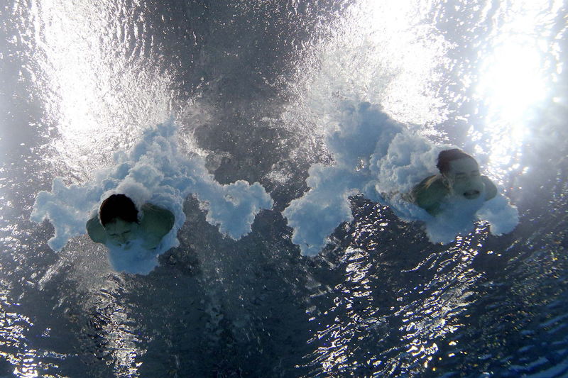 Diving - 17th FINA World Championship - Mixed 10m Synchro Platform Final - Budapest, Hungary 15 July 17 - Quan Ren and Junije Lian of China compete. Photo: Reuters