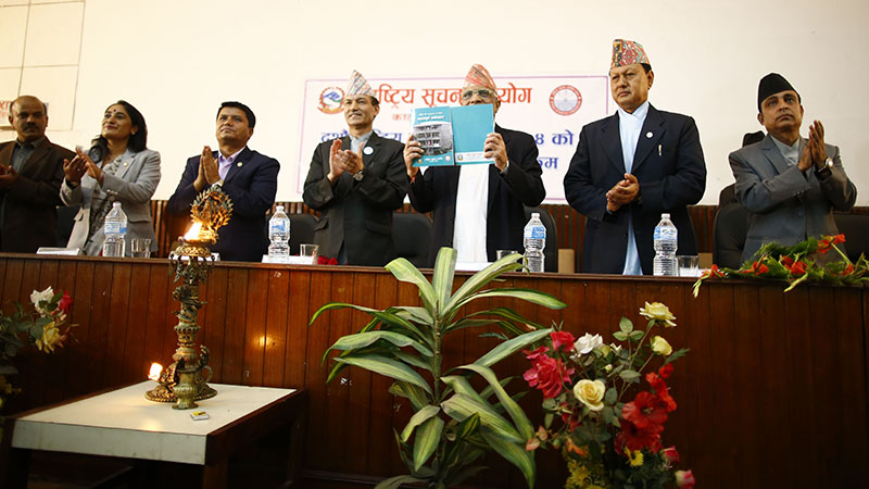 Chief Justice Gopal Prasad Parajuli unveiling the annual report of National Information Commission, in Lalitpur, on Friday, August 18, 2017. Photo: Skanda Gautam/THT