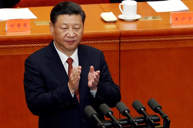 China's President Xi Jinping claps hands during the ceremony to mark the 90th anniversary of the founding of the China's People's Liberation Army at the Great Hall of the People in Beijing, China, on August 1, 2017. Photo: Reuters