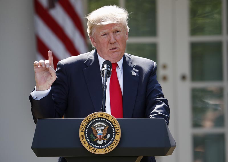 FILE -  US President Donald Trump speaks about the US role in the Paris climate change accord in the Rose Garden of the White House in Washington, on Thursday, June 1, 2017. Photo: AP