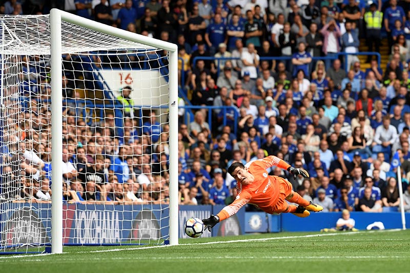 Chelsea's Thibaut Courtois looks on as Burnley's Sam Vokes scores a goal which is later disallowed in the Premier League match between Chelsea and Burnley, in London, Britain, on August 12, 2017. Photo: Action Images via Reuters