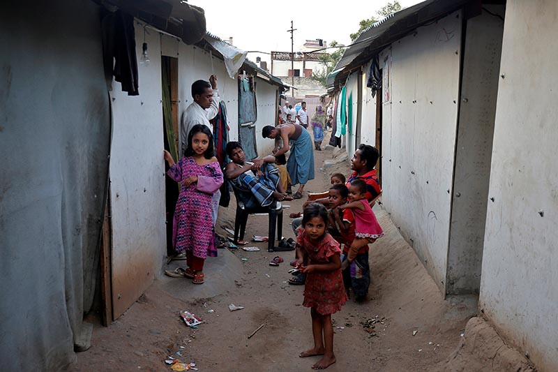 People belonging to Rohingya Muslim community sit outside their makeshift houses on the outskirts of Jammu, on May 5, 2017. Photo: Reuters/ File