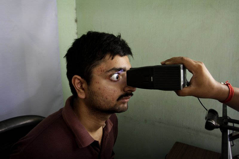 An Indian man gets his retina scanned as he enrolls for Aadhar, Indiau0092s unique identification project in Kolkata, India, on May 16, 2012.