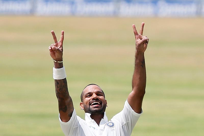 India's Shikhar Dhawan celebrates his century in third test match between Sri Lanka and India, in Pallekele, Sri Lanka, on August 12, 2017. Photo: Reuters