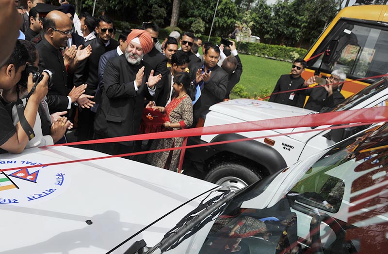 Indian Ambassador Manjeev Singh Puri handing over ambulances and vehicles to hospitals and organisations, in Kathmandu, on Tuesday, August 15, 2017. Photo: THT