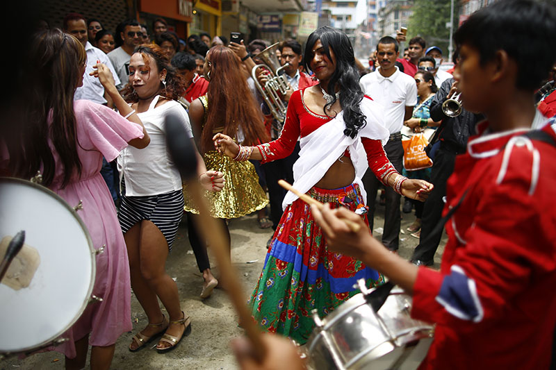Revellers observe dance during the pride parade of LGBT community. Photo: Skanda Gautam