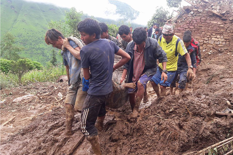 Locals resue victims buried in landslide in Baglung district, on Friday, August 4, 2017. Courtesy: Bharat Koirala