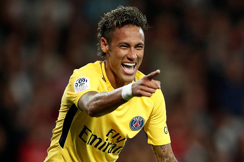 Paris Saint-Germainu2019s Neymar celebrates scoring their third goal in France Ligue 1 match between Guingamp and Paris St Germain, in Guingamp, France, on August 13, 2017. Photo : Reuters