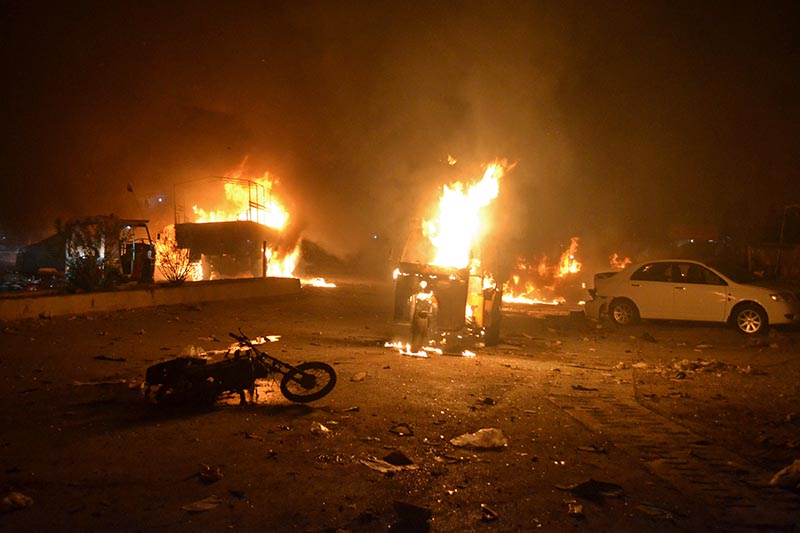 Vehicles are seen burning after a bomb blast in Quetta, Pakistan, on August 12, 2017. Photo: Reuters