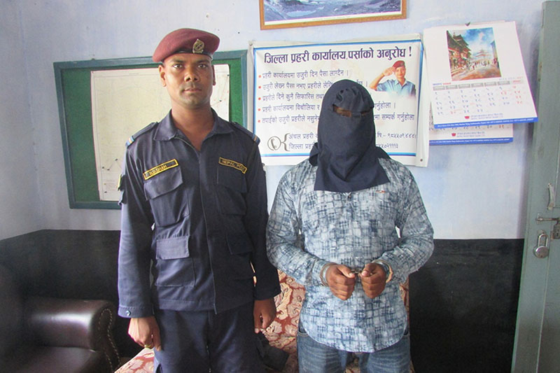 A police imposter being made pubic at the Parsa District Police Office, in Birgunj, on Sunday, August 6, 2017. Photo: Ram Sarraf