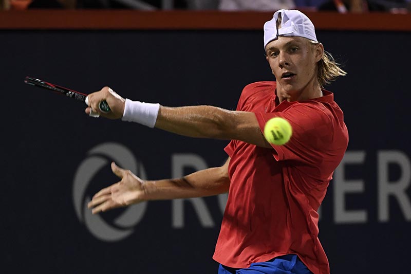 Denis Shapovalov of Canada hits a backhand against Rafael Nadal of Spain (not pictured) during the Rogers Cup tennis tournament at Uniprix Stadium, in Montreal, Quebec, Canada, on August 10, 2017. Photo: Eric Bolte-USA TODAY Sports via Reuters