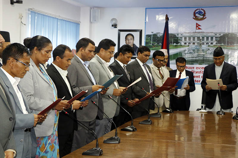 PM Sher Bahadur Deuba administers oath of office and secrecy to newly appointed eight Ministers of State at the Office of Prime Minister and Council of Ministers in Singha Durbar, Kathmandu, on Sunday, August 20, 2017. Photo: RSS