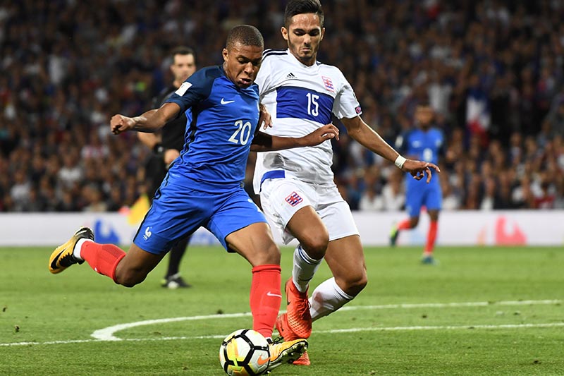 France's Kylian Mbappe in action with Luxembourgu2019s Aldin Skenderovic during the 2018 World Cup Europe qualification match between France and Luxembourg, in Toulouse, France, on September 3, 2017. Photo: Reuters