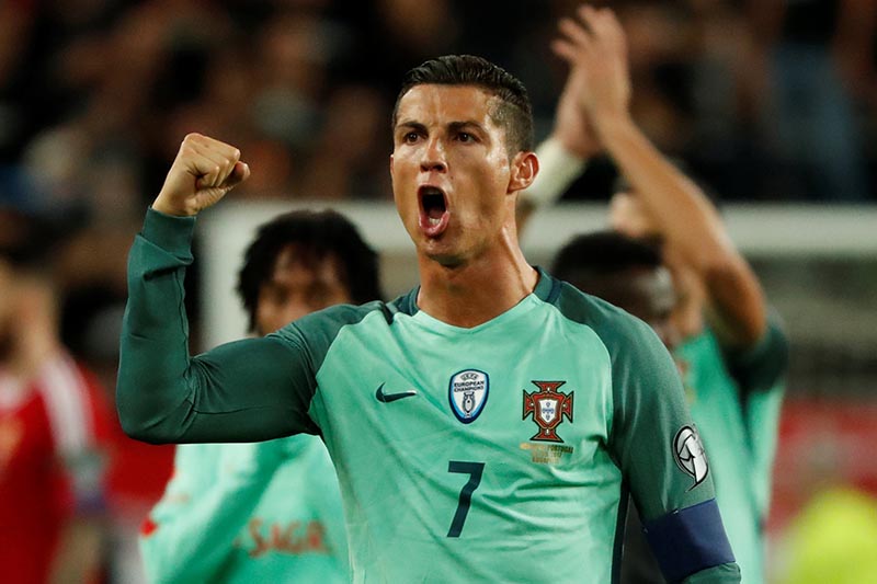 Portugalu2019s Cristiano Ronaldo celebrates after the 2018 World Cup Europe Qualification match between Hungary and Portugal, in Budapest, Hungary, on Sepember 3, 2017. Photo: Reuters