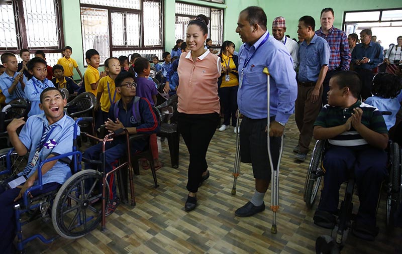 American national Jessica Cox, the world's first licenced differently abled pilot being greeted by children with disabilities in a programme organised at the BIA Foundation in Jorpati, Kathmandu, on Tuesday, September 05, 2017. Photo: Skanda Gautam