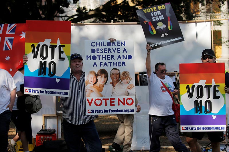Opponents of same-sex marriage in Australia attend a protest rally near a counter-demonstration supportive of same-sex marriage at a park in Sydney, Australia, on September 23, 2017. Photo: Reuters