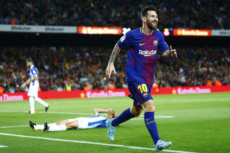 FC Barcelona’s Lionel Messi celebrates after scoring during the Spanish La Liga soccer match between FC Barcelona and Espanyol at the Camp Nou stadium in Barcelona, Spain, on Saturday, September 9, 2017. Photo: AP