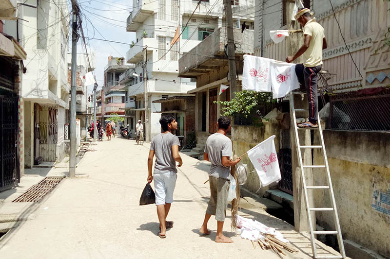 Cadres affilated to a political party hang flag as part of election campaign for the upcoming local polls in Birgunj Metropolitan city, on Monday, September 4, 2017. Photo: Ram Sarraf