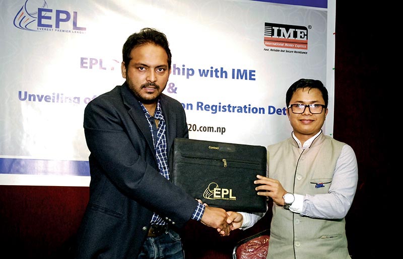 Managing Director of EPL Pvt Ltd Aamir Akhtar and IMEu2019s Senior Managar Daniel Shrestha (right) exchanging the MoU at a programme in Kathmandu on Sunday.