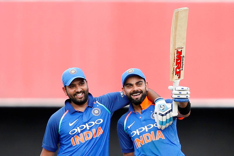 Team captain Virat Kohli of India celebrates his century with his teammate Rohit Sharma in the Fourth One day International match between Sri Lanka and India, in Colombo, Sri Lanka, on August 31, 2017. Photo: Reuters
