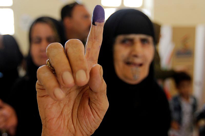A woman shows her ink-stained finger during Kurds independence referendum in Kirkuk, Iraq, on September 25, 2017. Photo: Reuters