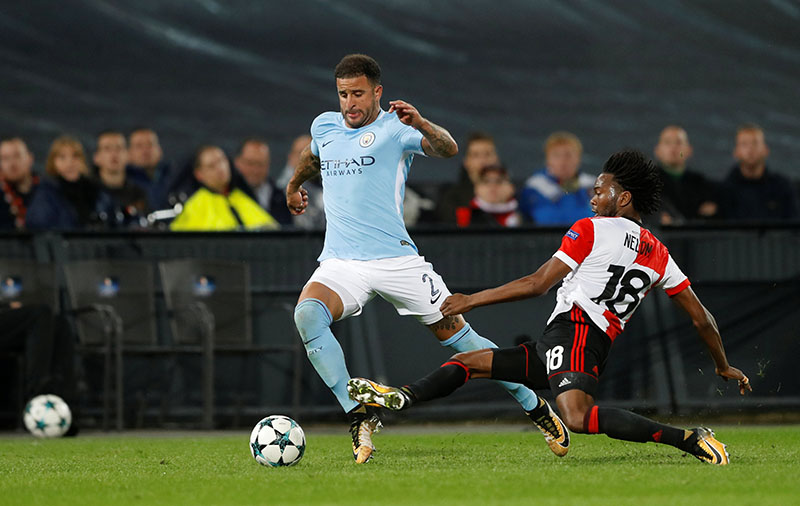 Feyenoord's Miquel Nelom in action with Manchester Cityu2019s Kyle Walker. Photo: Reuters