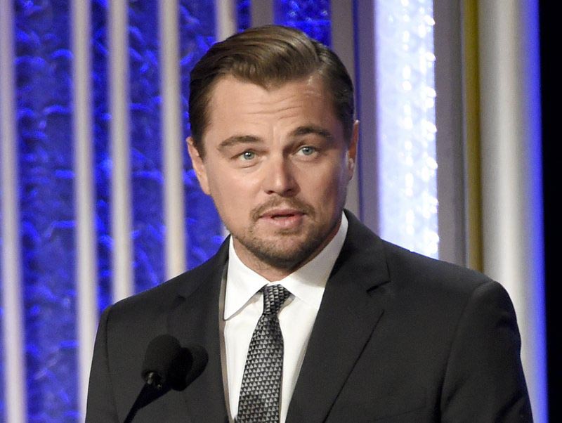 Leonardo DiCaprio accepts the Hollywood documentary award for u201cBefore the Floodu201d at the 20th annual Hollywood Film Awards in Beverly Hills, California, on November 6, 2016. Photo: AP/ File