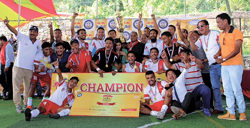 Players and officials of Shankhamul Futsal reacts after winning the National Futsal League in Kathmandu. Photo: THT