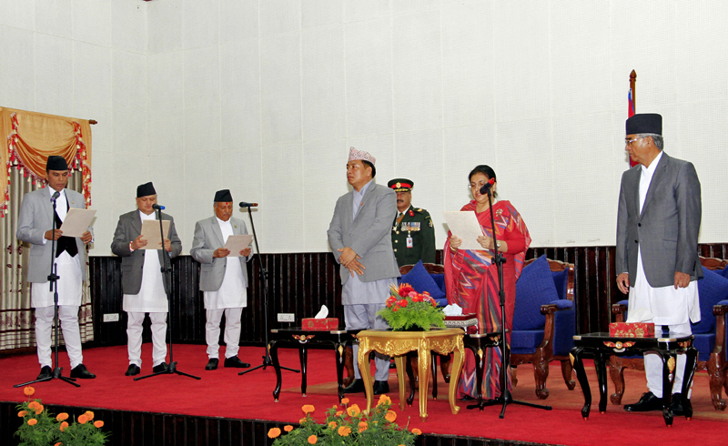 President Bidya Devi Bhandari administers the oath of office and secrecy to newly appointed Minister for Science and Technology Deepak Bohara, Minister for Forest and Soil Conservation Bikram Pandey and Minister for Industry Sunil Bahadur Thapa at Sheetal Niwal, Maharajgunj, on Monday, September 11, 2017. Photo Courtesy: President's Office