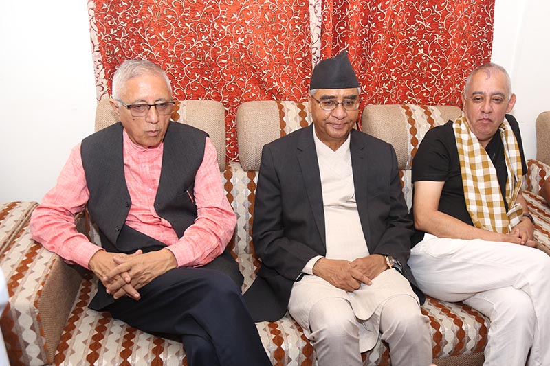 Prime MInister Sher Bahadur Deuba (centre), Nepali Congress General Secretary Shashanka Koirala (right) and leader Shekhar Koirala at the Biratnagar airport, in Morang district, on Tuesday, September 12, 2017. Photo: RSS