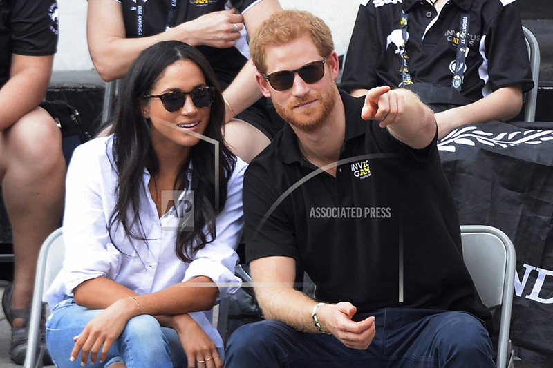 Prince Harry and his girlfriend Meghan Markle attend a wheelchair tennis event at the Invictus Games in Toronto, Monday, Sept. 25, 2017. Photo: AP