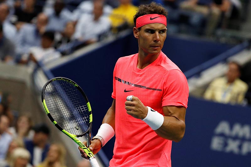 Rafael Nadal of Spain reacts to winning second set against Andrey Rublev of Russia. Photo: Reuters